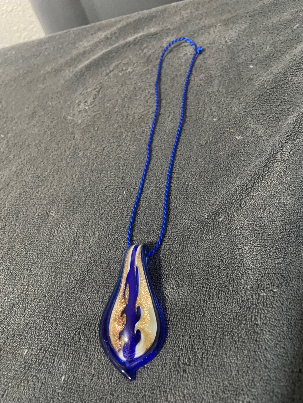 Blue Glass Flame Pendant Necklace with Gold Accents
